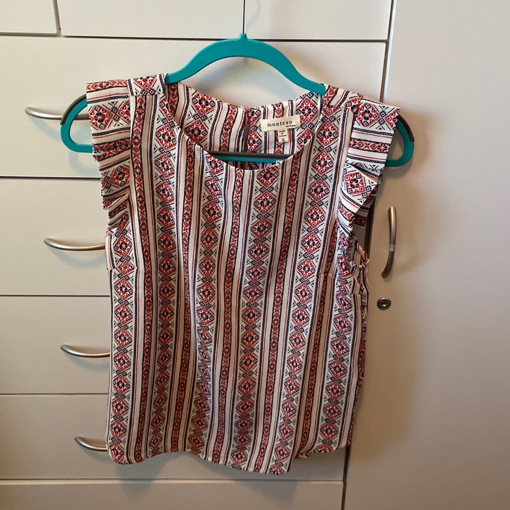 Red and black patterned blouse